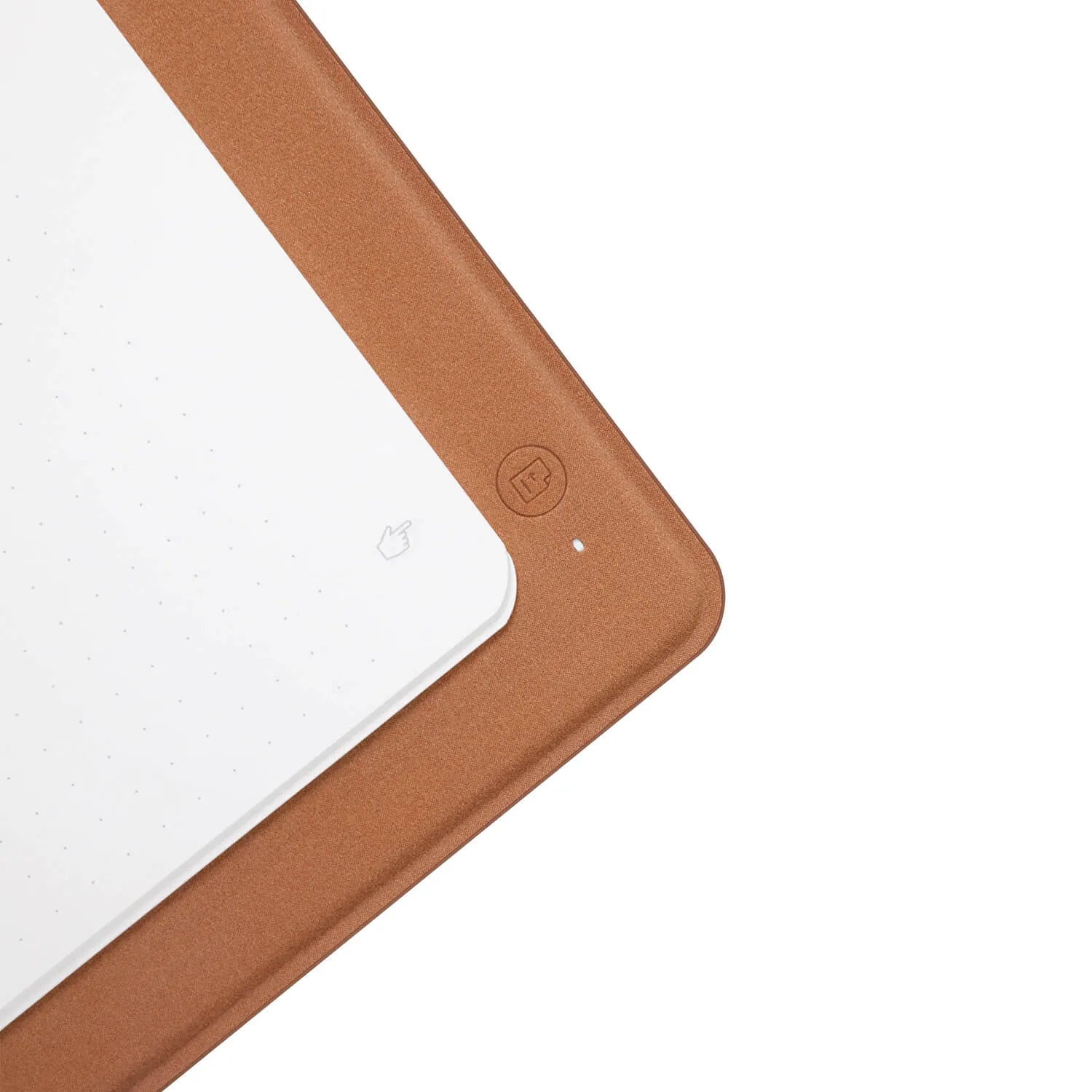 Close-up corner view of Syncify digital notebook showing brown cover and dotted white page of syncifybook sketchbook duo pro